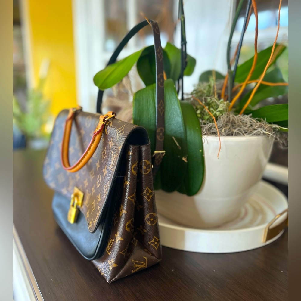 Louis Vuitton
Marignan Handbag Monogram Canvas with Leather $1600 - Picture 5 of 16